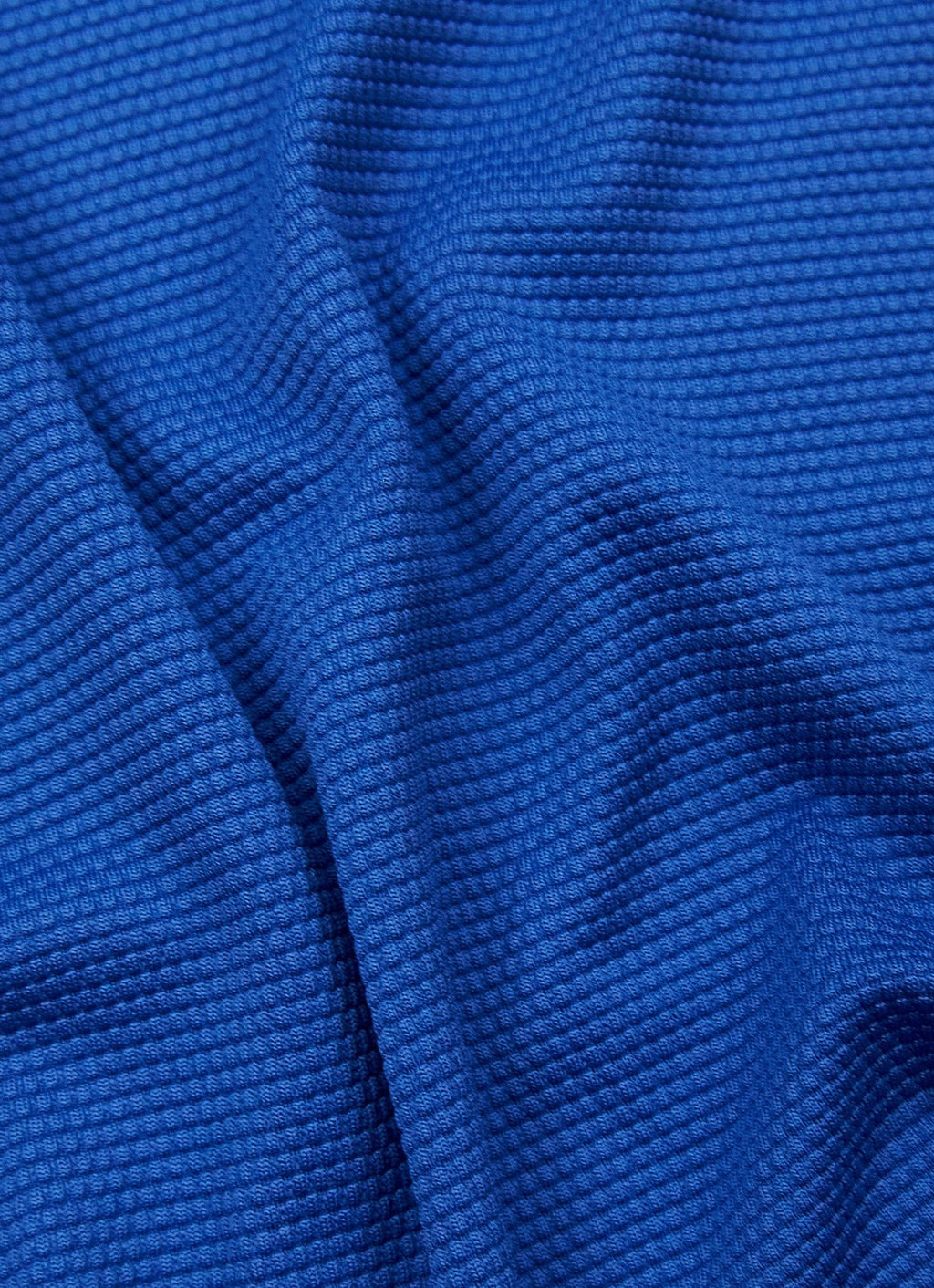 Pebble Jacquard Stretch Polo — Metal-Rimmed Buttons, Tonal Inner Yoke, Bungee Locker Loop