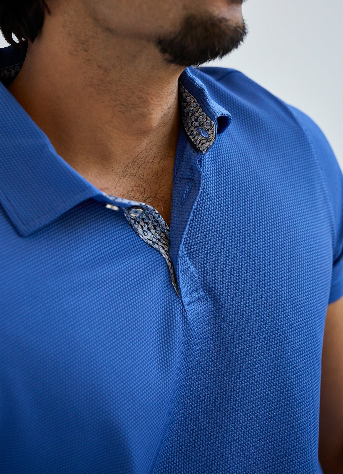 Pebble Jacquard Stretch Polo — Metal-Rimmed Buttons, Tonal Inner Yoke, Bungee Locker Loop