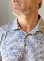 Short Sleeve Stretch Polo — Circle Pattern, Soft Smooth Fabric, Metal-Rimmed Buttons