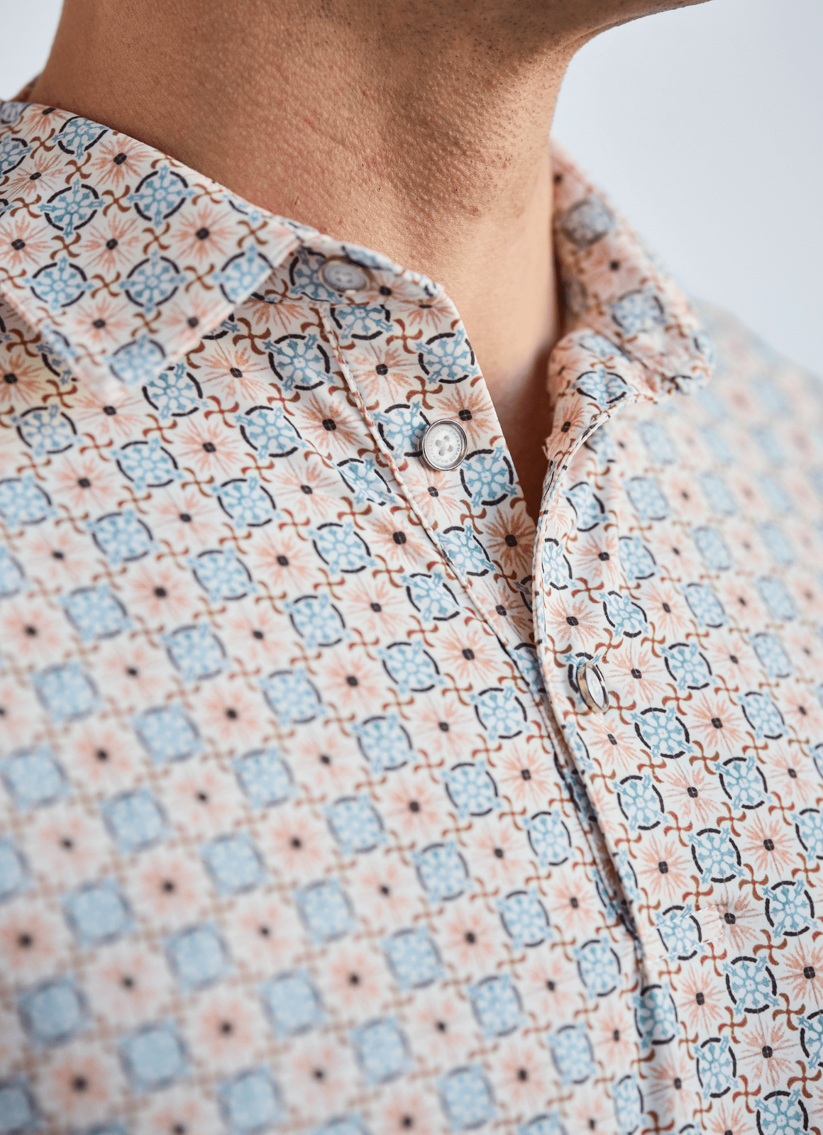 Printed Stretch Polo — Tan & Blue Tile Print, Buttery Smooth Fabric, Metal-Rimmed Buttons