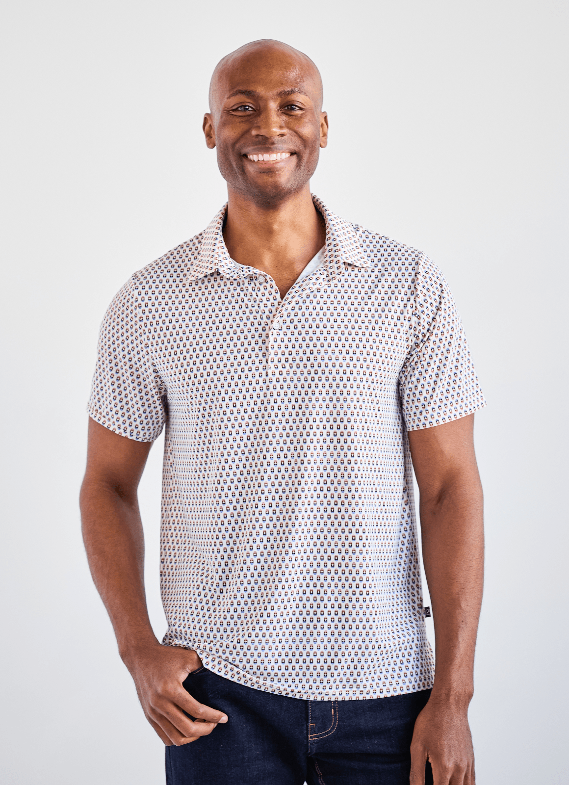 Printed Stretch Polo — Blue & Brown Pill Pattern, Buttery Smooth Fabric, Metal-Rimmed Buttons