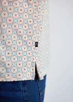 Printed Stretch Polo — Tan & Blue Tile Print, Buttery Smooth Fabric, Metal-Rimmed Buttons