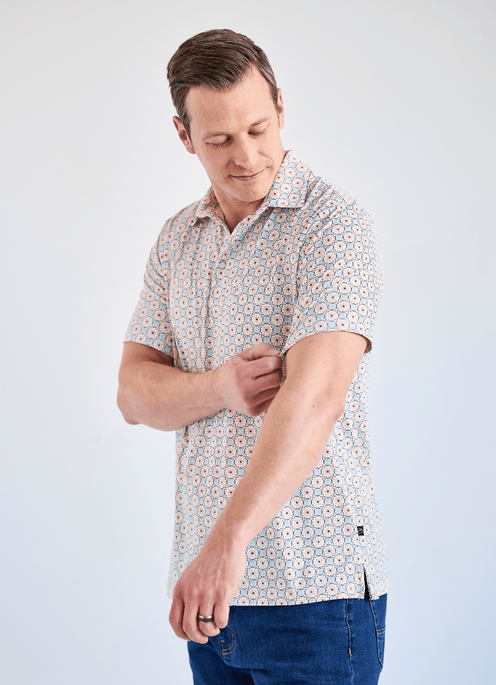 Printed Stretch Polo — Tan & Blue Tile Print, Buttery Smooth Fabric, Metal-Rimmed Buttons