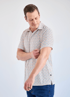 Printed Stretch Polo — Tan & Blue Tile Print, Buttery Smooth Fabric, Metal-Rimmed Buttons
