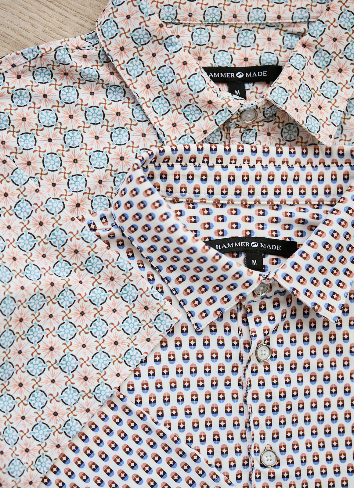 Printed Stretch Polo — Blue & Brown Pill Pattern, Buttery Smooth Fabric, Metal-Rimmed Buttons